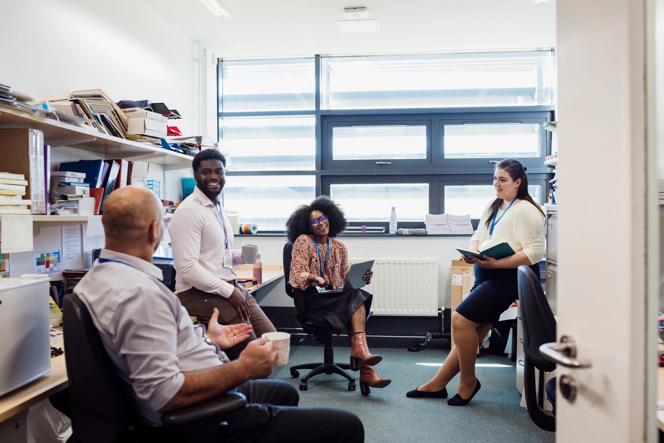 Team members connecting in an office